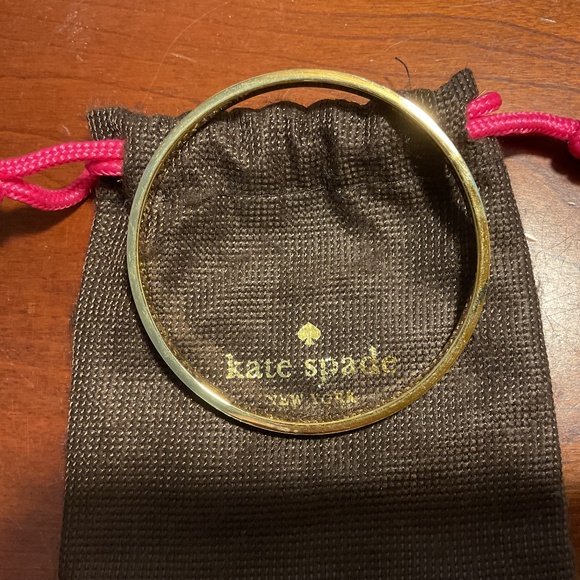 Vintage Kate Spade New York Orange Bangle Bracelet with the cut out “Spade”. - Picture 3 of 4